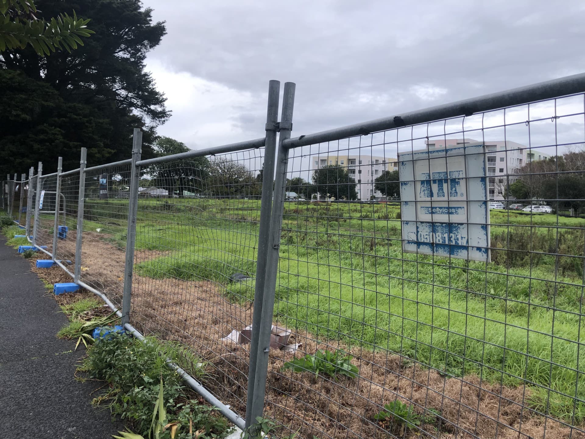 In Onehunga, Auckland, the site where a 186-apartment Kainga Ora development was planned now sits empty, after tenants of the previous building moved out and the new project was cancelled.