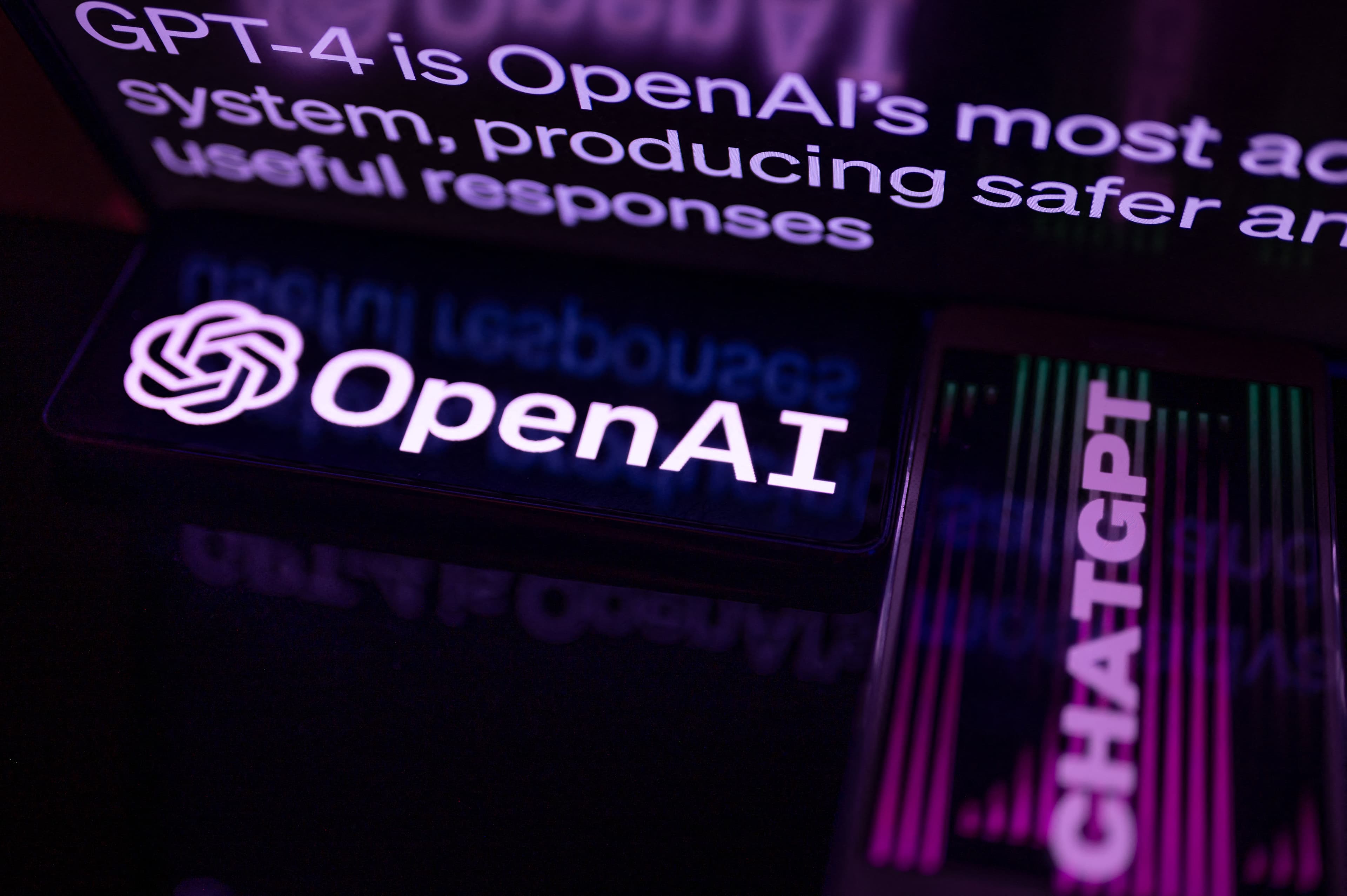 OpenAI is displayed on a smartphone with ChatGPT 4 seen in the background, in this photo illustration, in Brussels, Belgium, on 20 September, 2023.