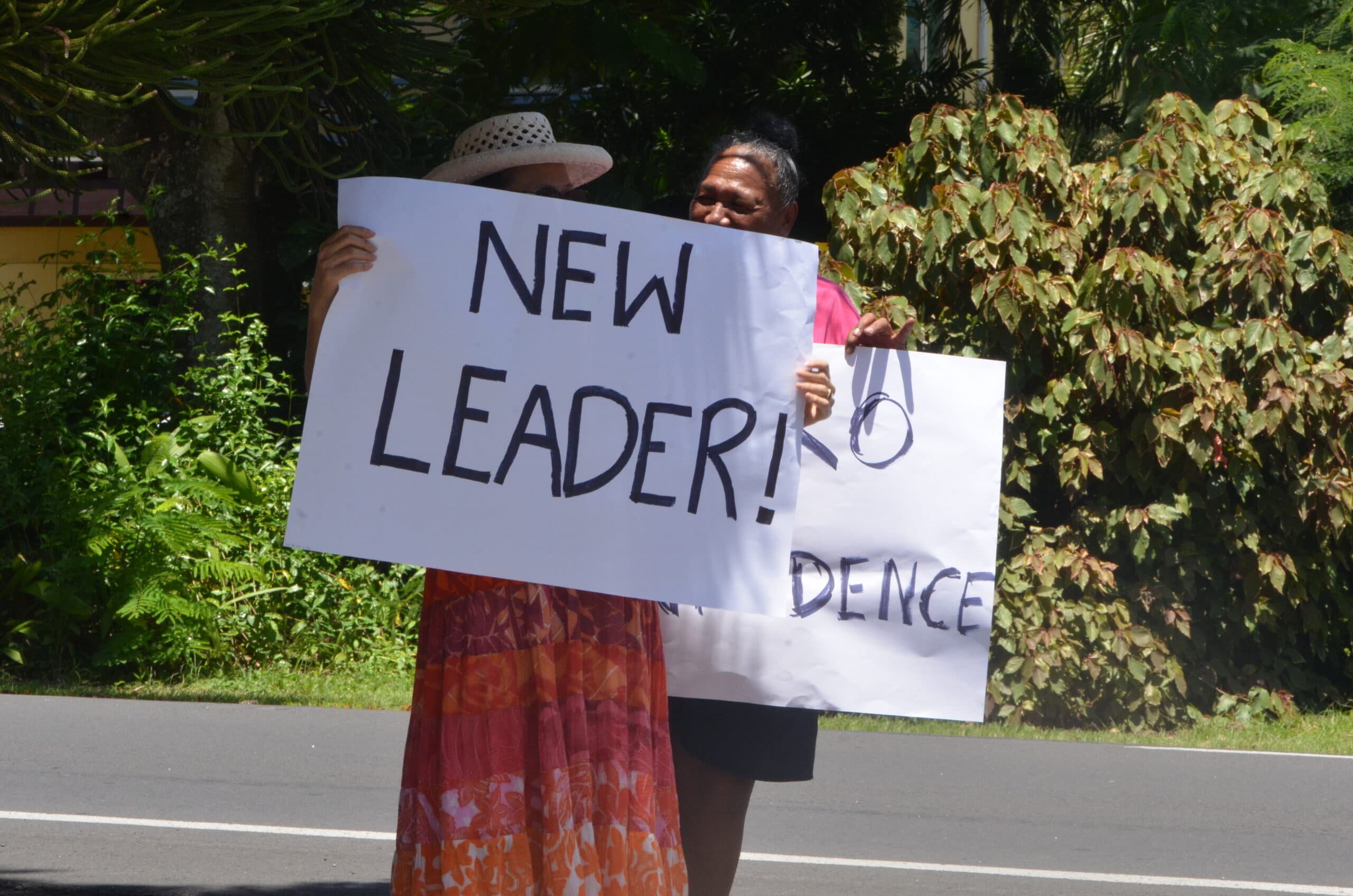 A group of women supporting the no-confidence motion against the Prime Minister and his Cabinet with their banners outside Parliament yesterday. TALAIA MIKA