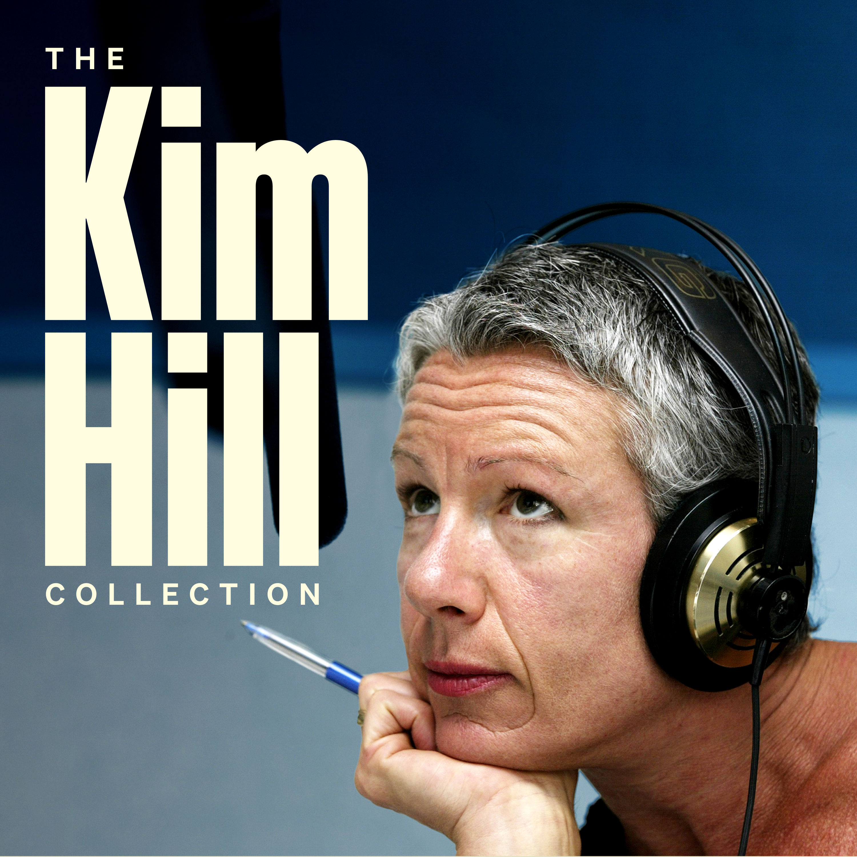 A thoughtful woman with short grey hair wearing headphones listens intently. The words "The Kim Hill Collection" appear on the left of frame.