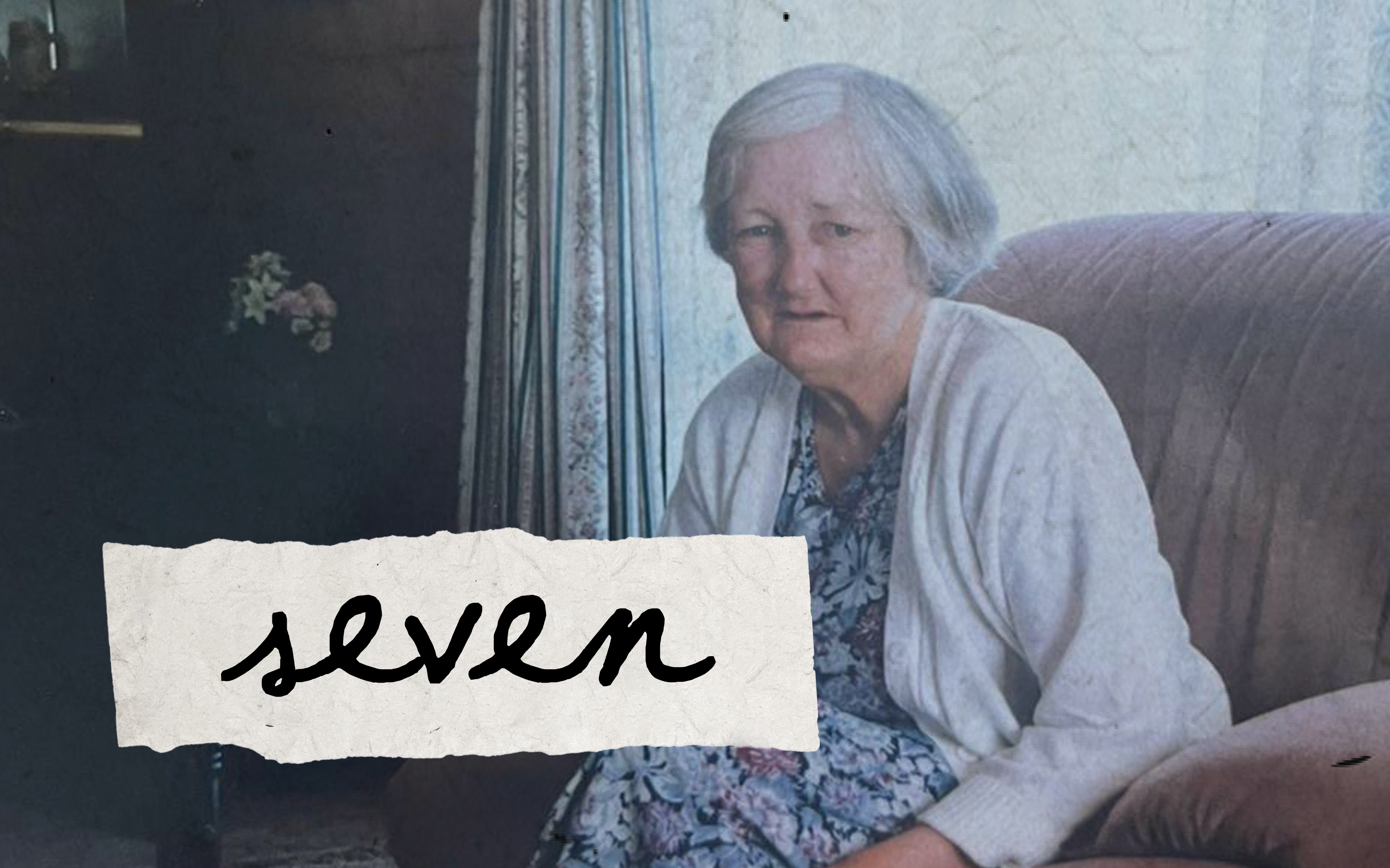 Title "seven" overtop old photograph of a elderly lady sitting on a couch