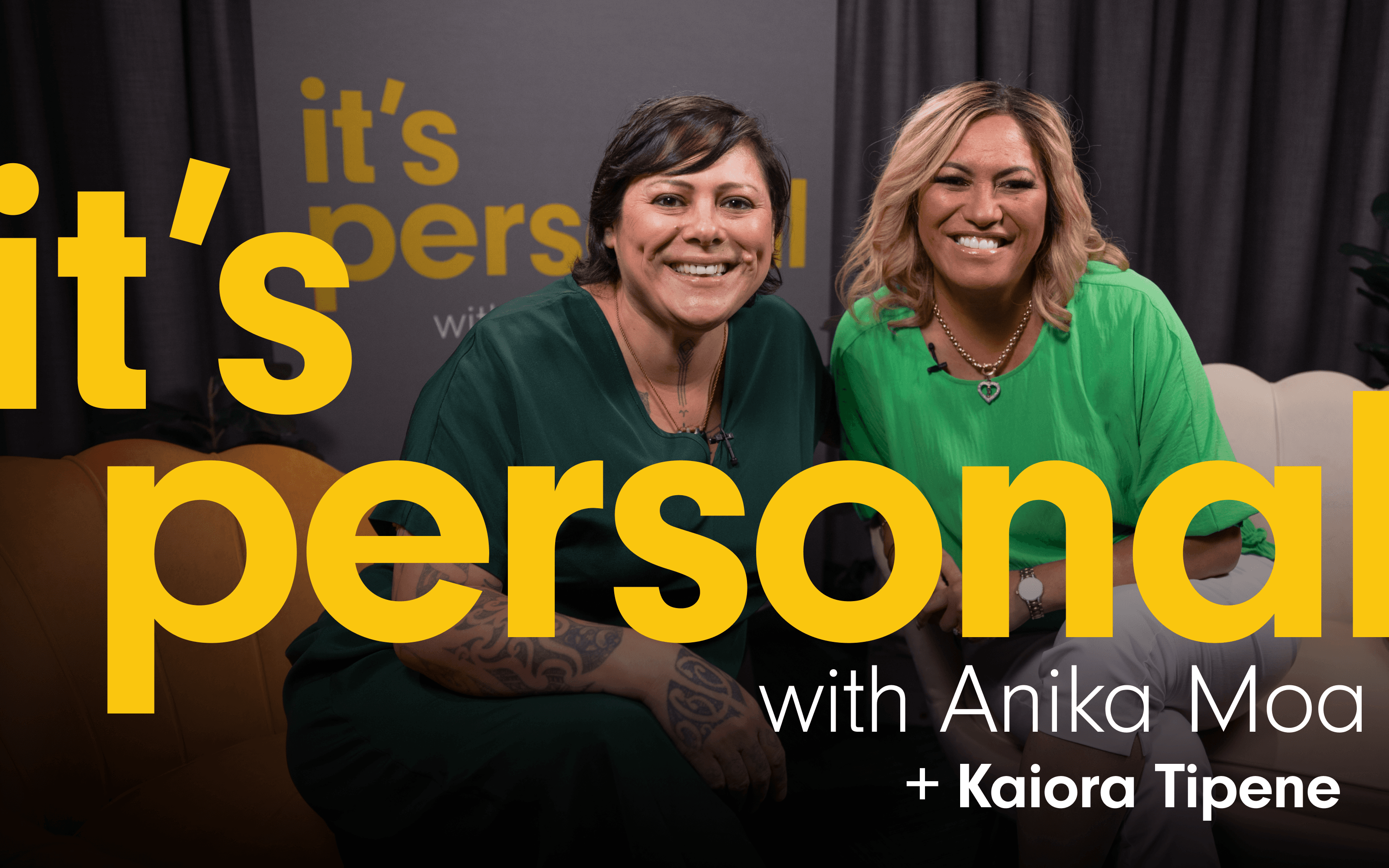 Photo of Anika Moa and guest smiling. They are sitting on the couches where the interview takes place. The podcast title ‘It’s Personal with Anika Moa ’ Is written Plus the guest’s name,