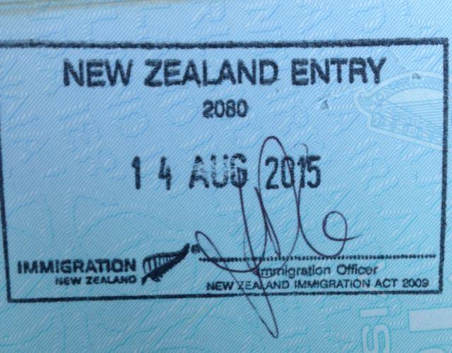 An image of a stamp in a passport, confirming residency in New Zealand.