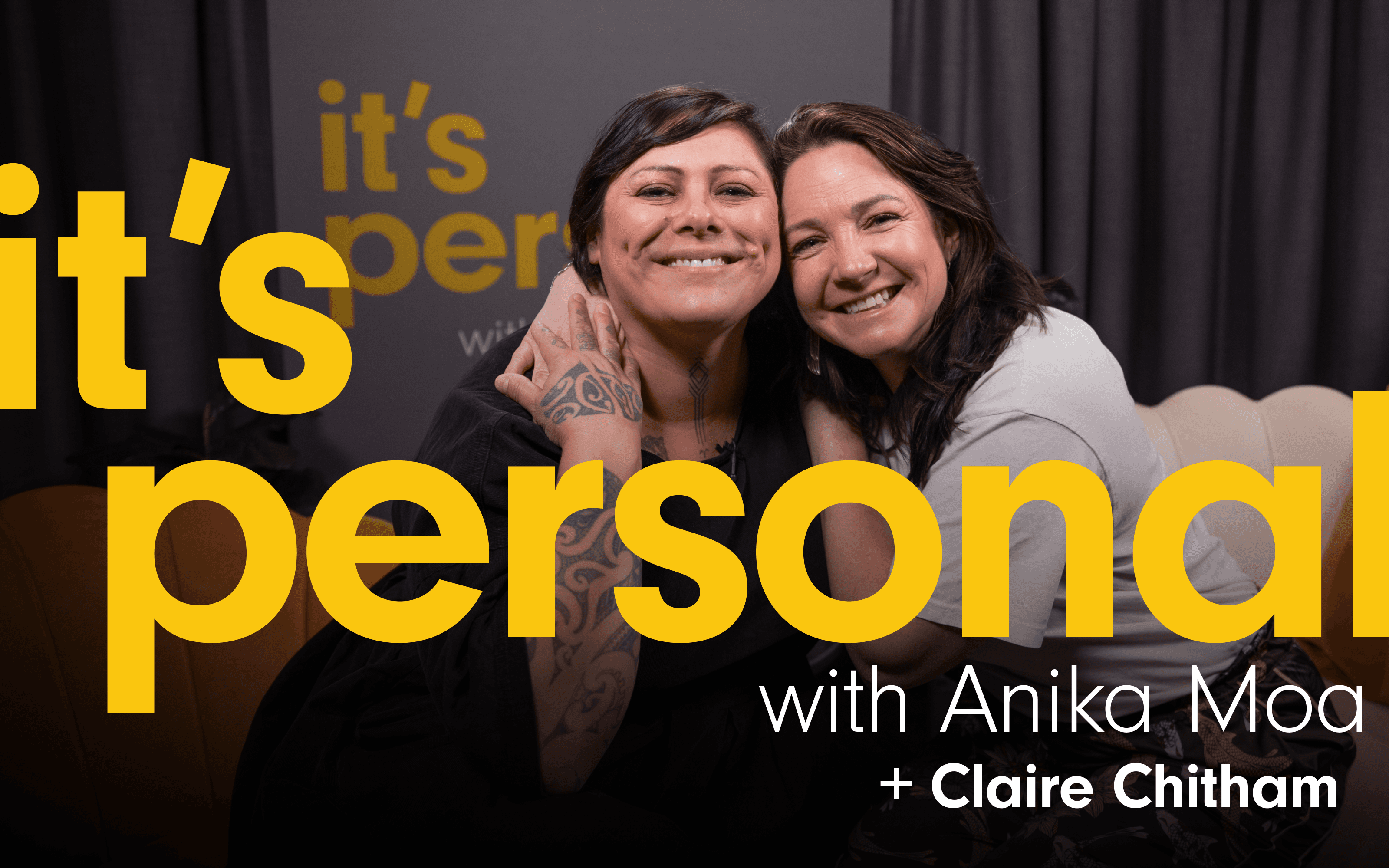 Photo of Anika Moa and guest smiling. They are sitting on the couches where the interview takes place. The podcast title ‘It’s Personal with Anika Moa ’ Is written Plus the guest’s name,