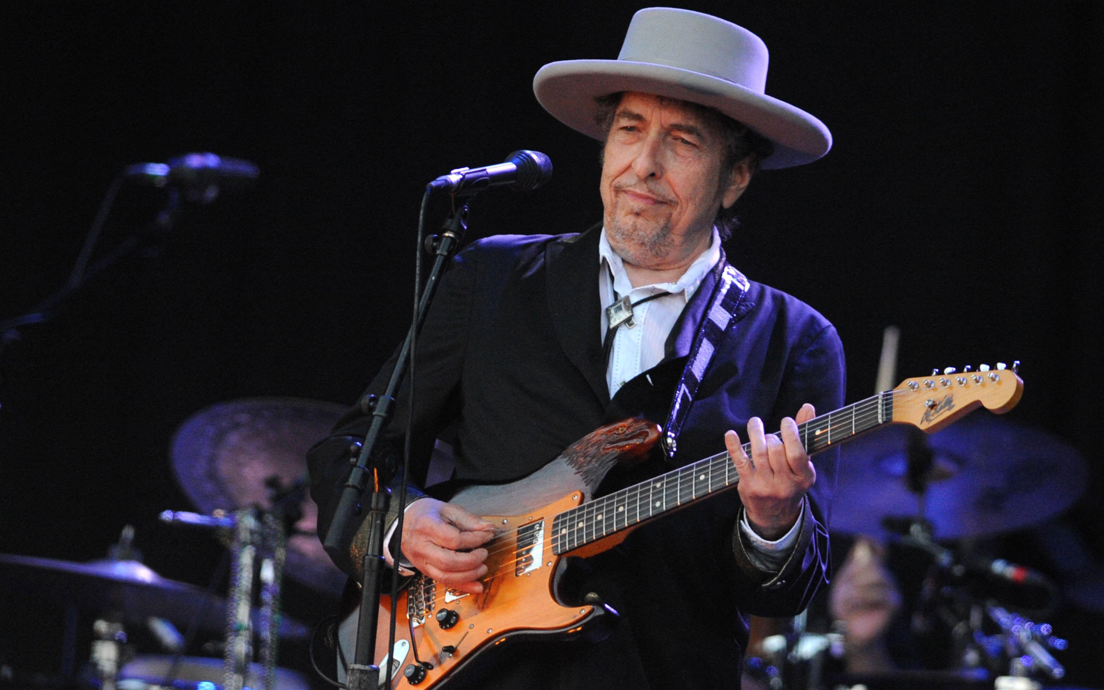 (FILES) In this file photo taken on July 22, 2012 US legend Bob Dylan performs on stage during the 21st edition of the Vieilles Charrues music festival in Carhaix-Plouguer, western France.