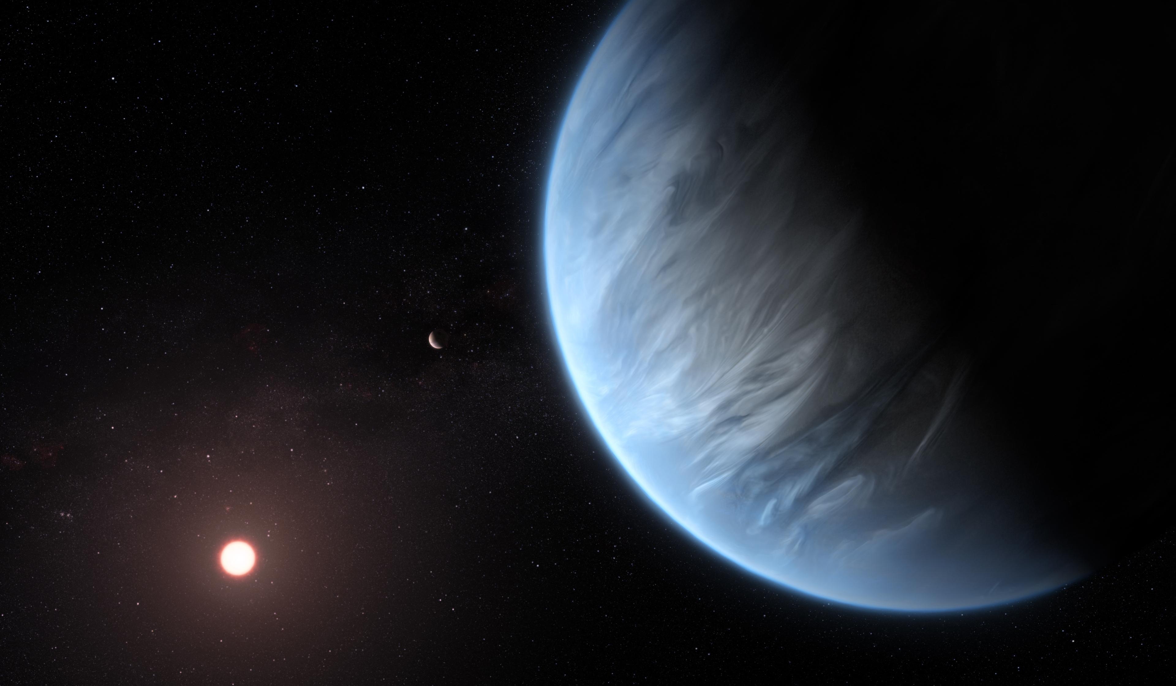 A handout artist's impression released on September 11, 2019, by ESA/Hubble shows the K2-18b super-Earth, the only super-Earth exoplanet known to host both water and temperatures that could support life. For the first time, water has been discovered in the atmosphere of a exoplanet with Earth-like temperatures that could support life as we know it, scientists revealed on September 11, 2019. (Photo by M. KORNMESSER / ESA/Hubble / AFP) / RESTRICTED TO EDITORIAL USE - MANDATORY CREDIT "AFP PHOTO /ESA/HUBBLE/M.KORNMESSER " - NO MARKETING - NO ADVERTISING CAMPAIGNS - DISTRIBUTED AS A SERVICE TO CLIENTS