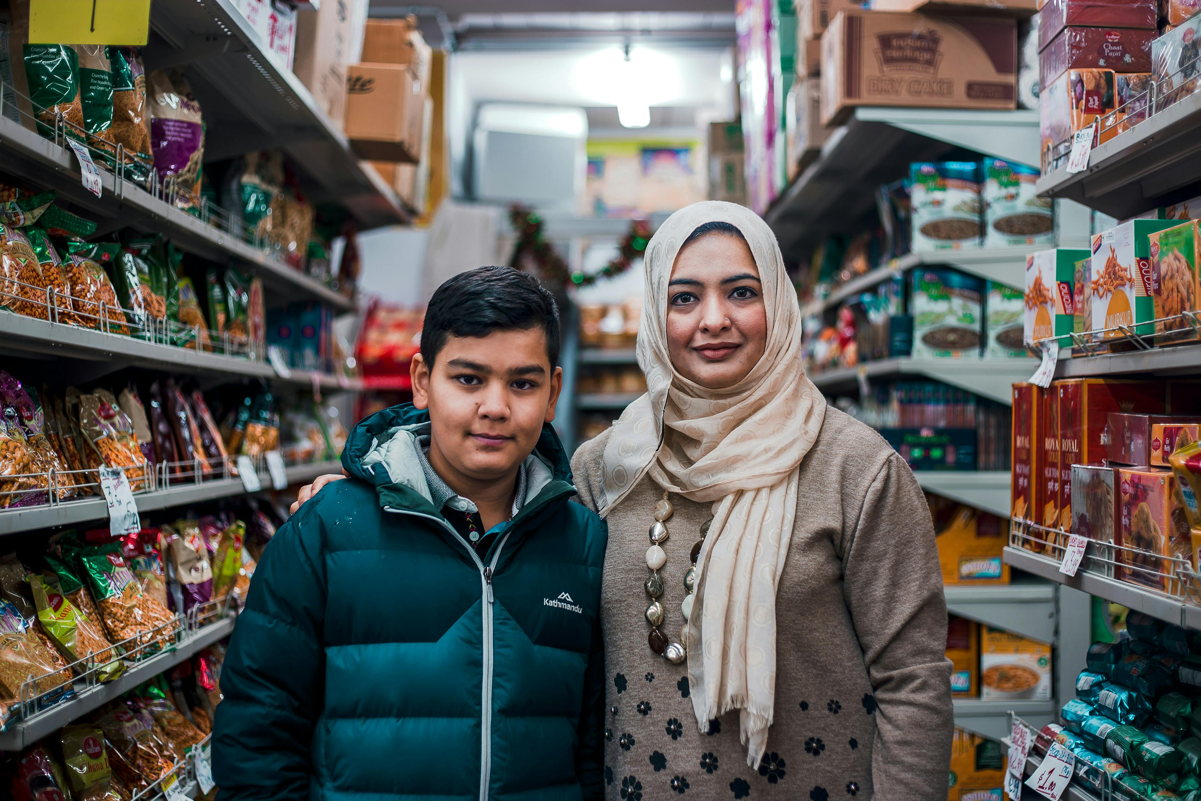 (L-R) Aliyaan Abbas and mother Masooma Mehdi in their local desi food store.