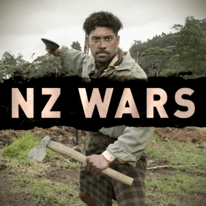 A 19th century Māori warrior stands in on a battlefield brandishing a patu and axe. Text reads "NZ Wars"