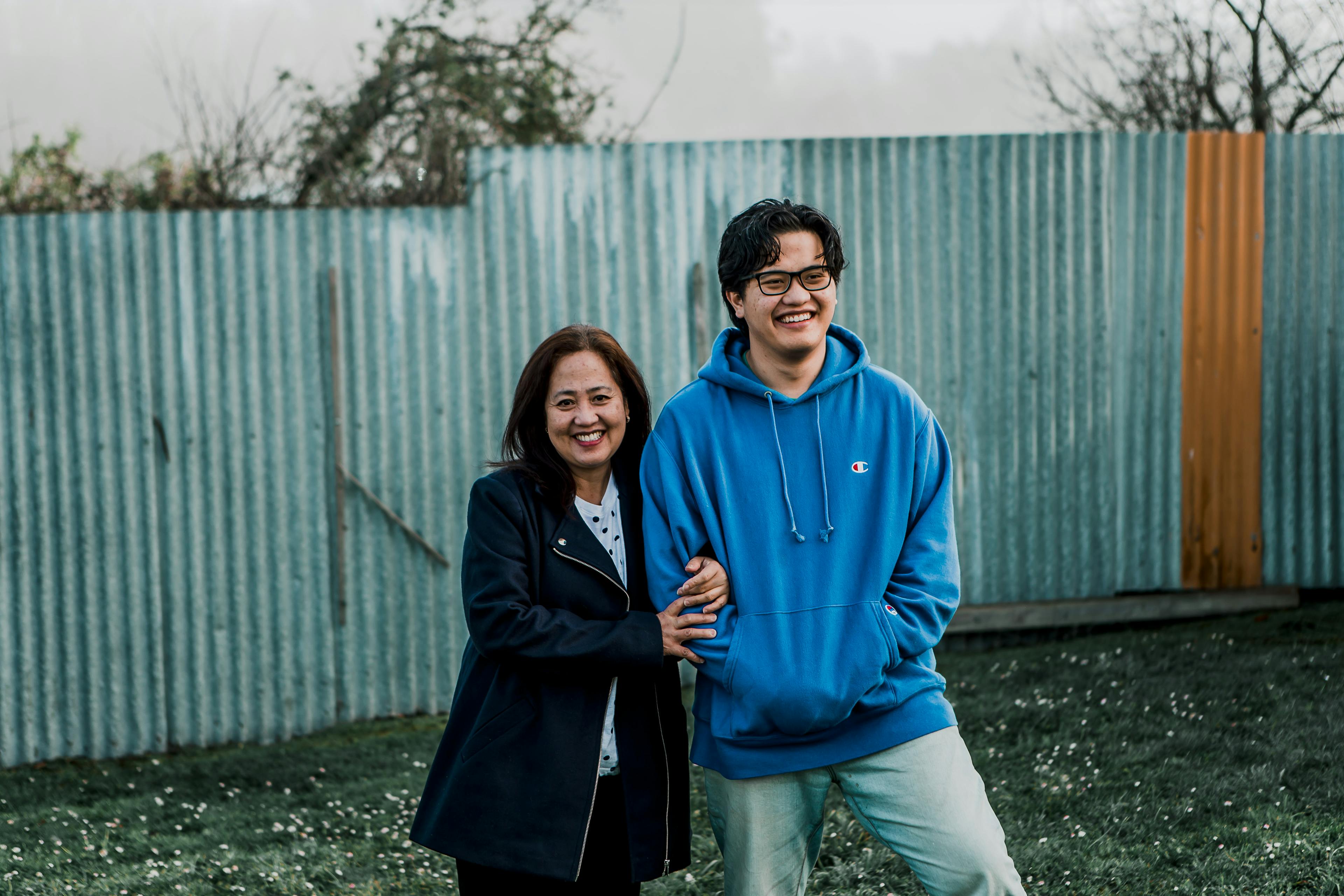 (L-R) Grace Trinidad and her son Joseph in their backyard in Waipawa, Hawke's Bay.