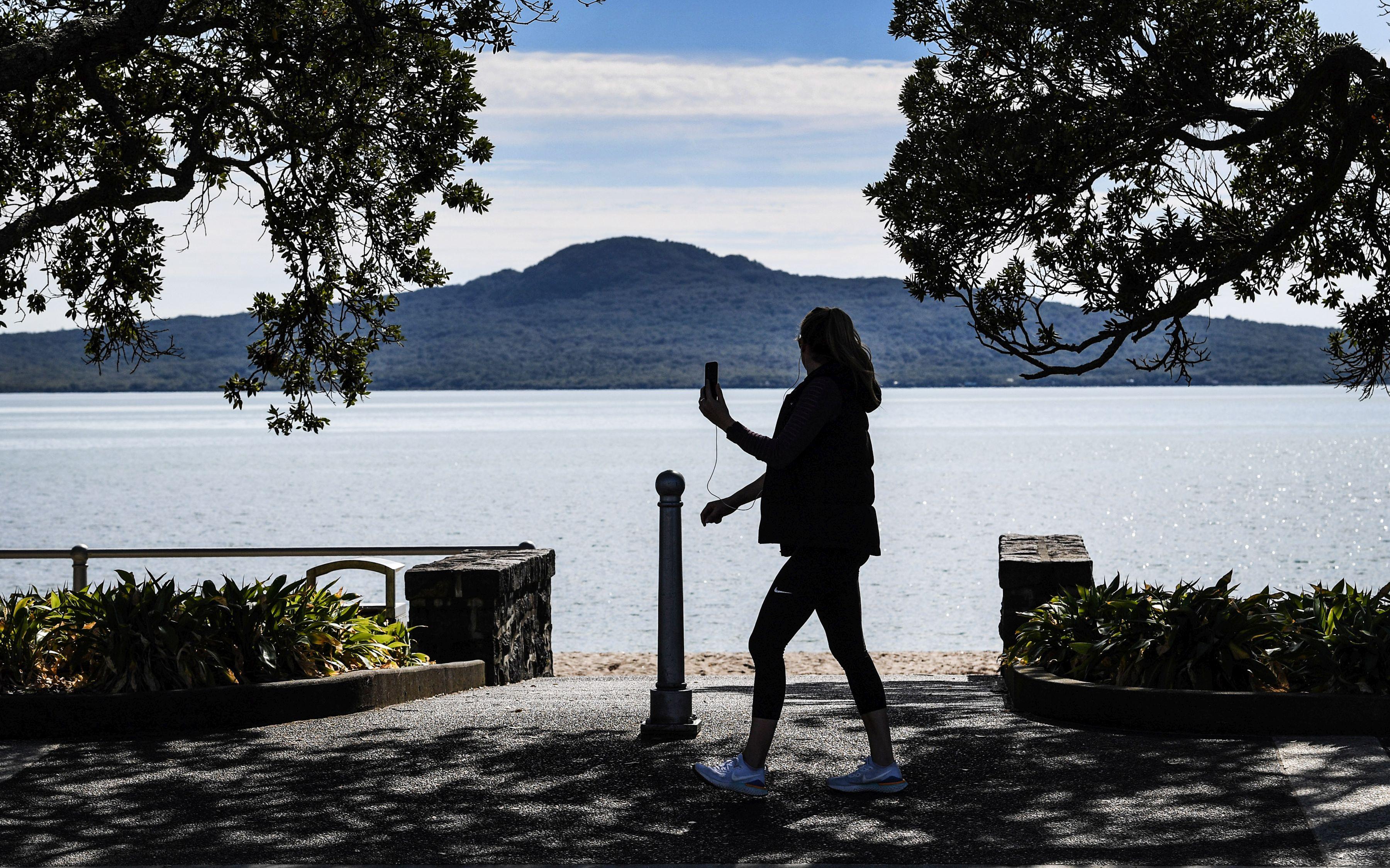 Walking at Auckland's Kohimarama Beach during the lockdown due to Covid-19.