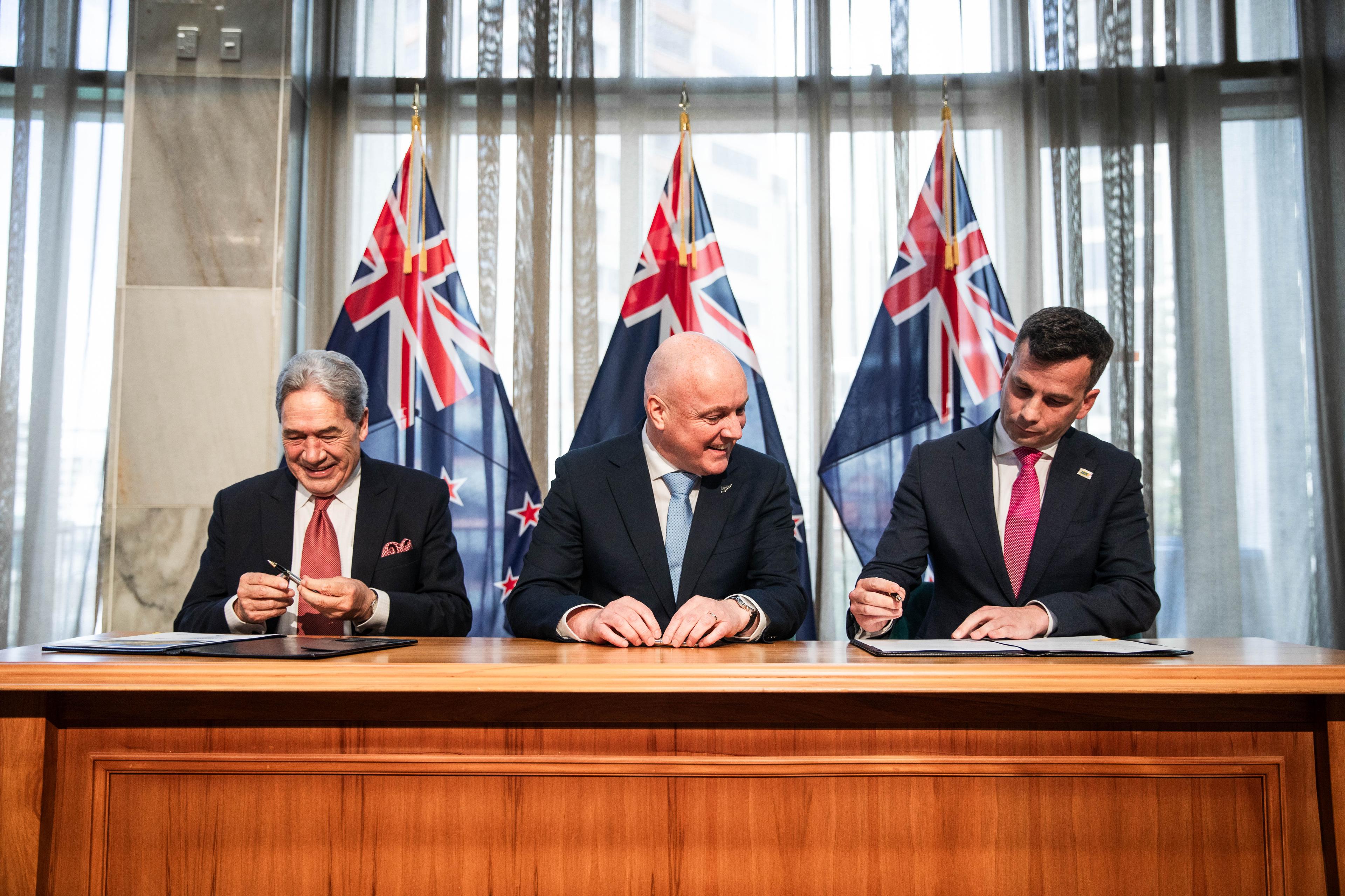 NZ First leader Winston Peters, National Party leader Christopher Luxon and ACT Party leader David Seymour at the formal signing ceremony on 24 November, 2023.