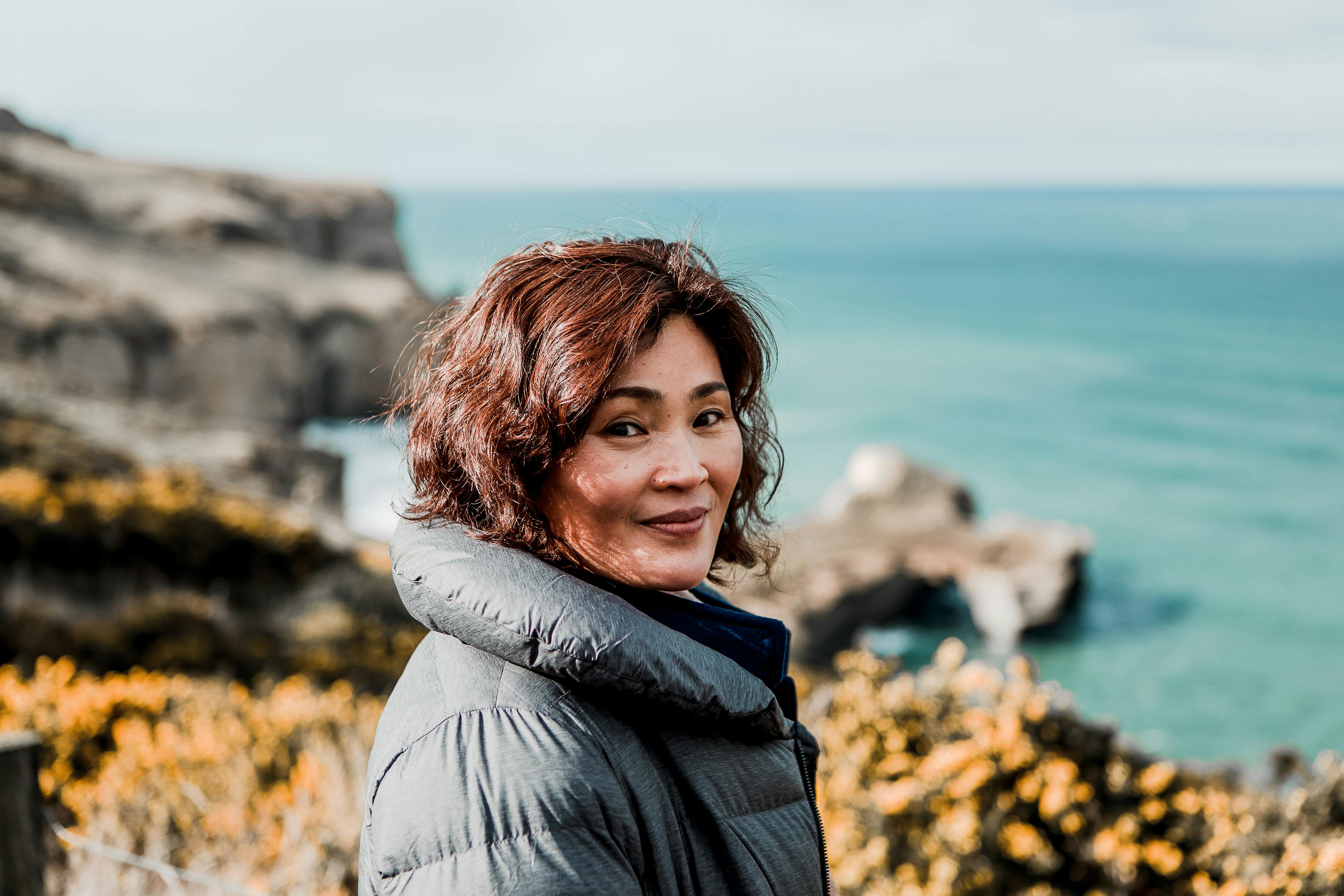 Sue Kim near Tunnel Beach, Ōtepoti.