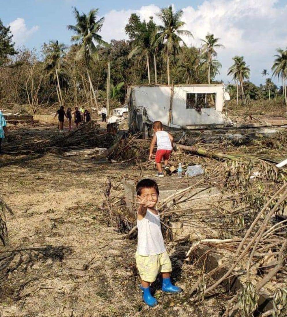 Children in Nuku'alofa in the aftermath of the eruption of Hunga Tonga-Hunga Ha'apai and tsunami.