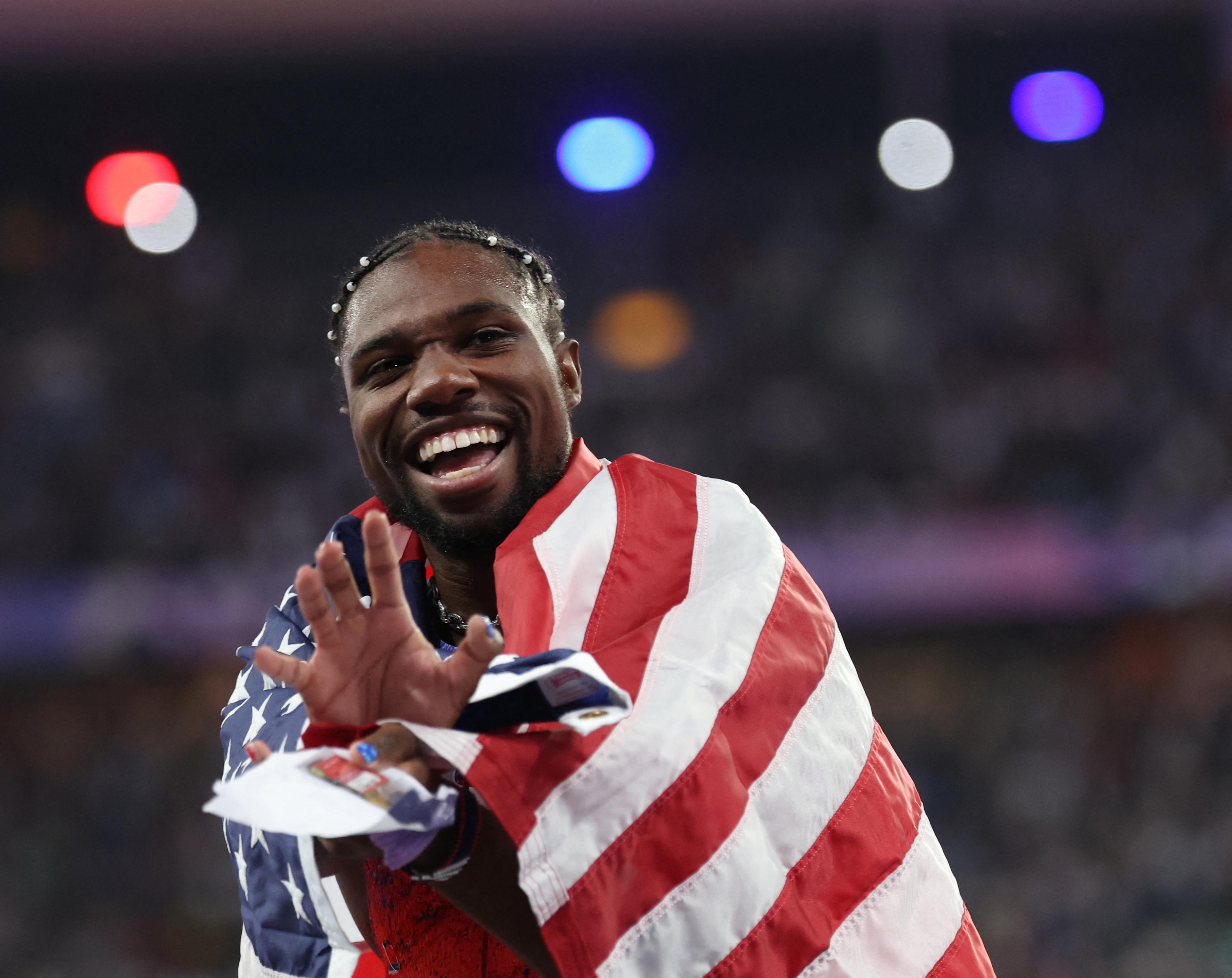 Noah Lyles of United States reacts after winning the men's athletics 100-meter final at the Paris Olympics at the Stade de France in Saint-Denis, France on August 4, 2024.