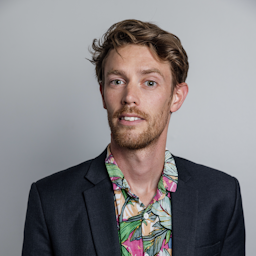 A headshot of comedian Tim Batt.