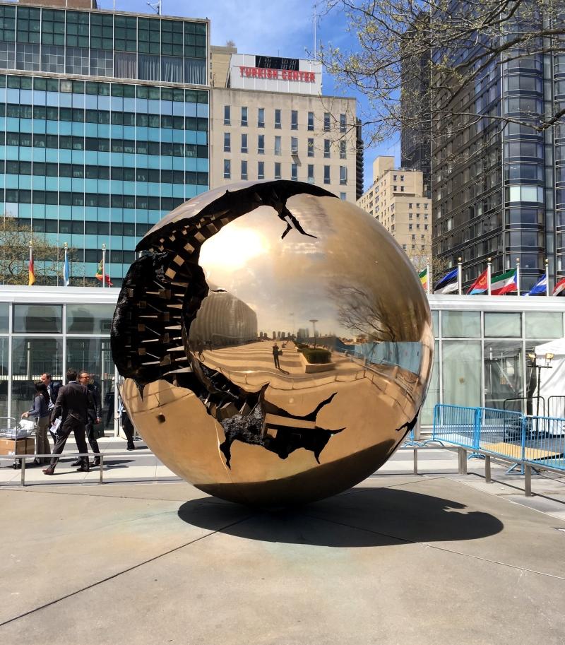 A view of the Sphere Within Sphere sculpture outside the UN General Headquarters in NYC.