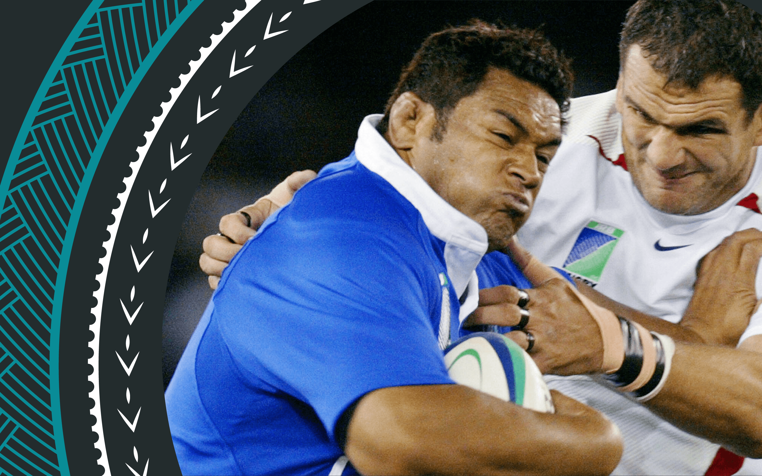 A close up photo of Samoan prop Kas Lealamanua fending off the tackle from England's captain Martin Johnson in the Rugby World Cup pool C match between England and Samoa at the Telstra Dome in Melbourne 26 October 2003.