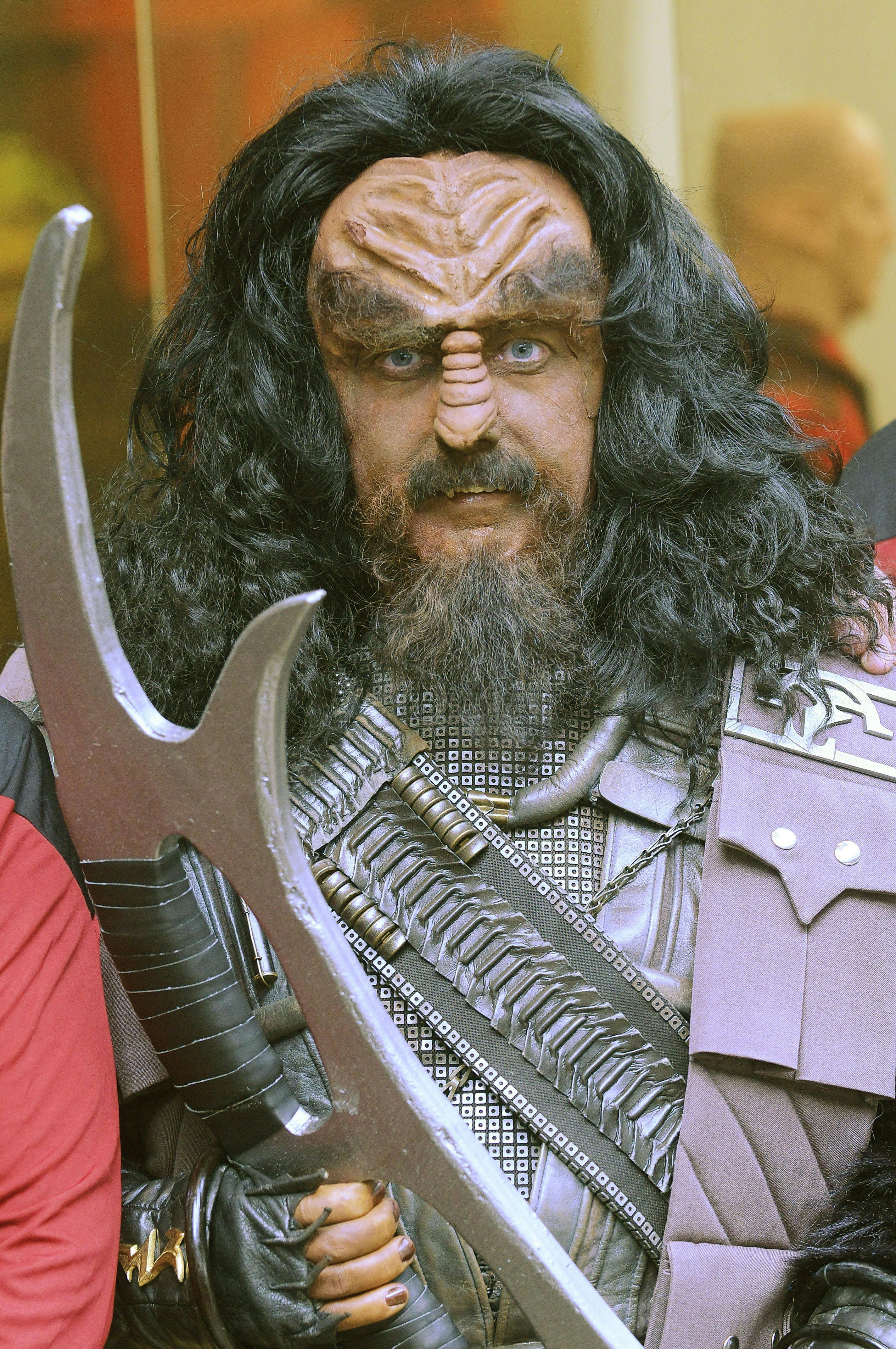 A participant dressed as a "Klingon" warrior from the cult TV series Star Trek poses for a photograph during the "Fedcon XVII" Sci-Fi and Star Trek convention in Bonn, on April 18, 2008.  The Fedcon is Europe's largest Sci-Fi fair and will last till April 20. AFP PHOTO DDP/HENNING KAISER     GERMANY OUT (Photo by HENNING KAISER / DDP / ddp images via AFP)