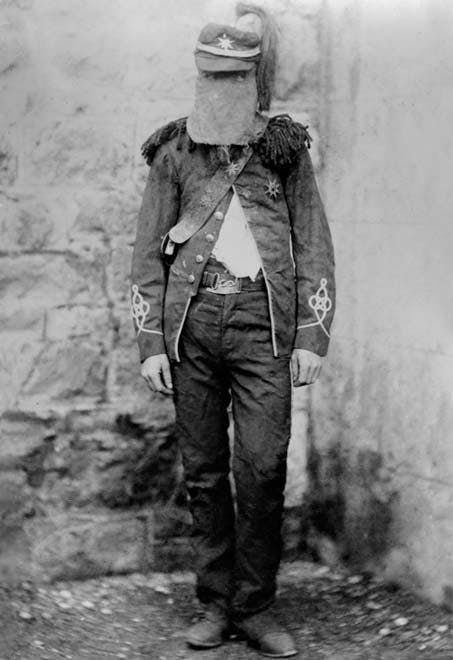 New Plymouth Highwayman Robert Wallath shortly after his arrest  1893 wearing his mask, army coat and plumed hat