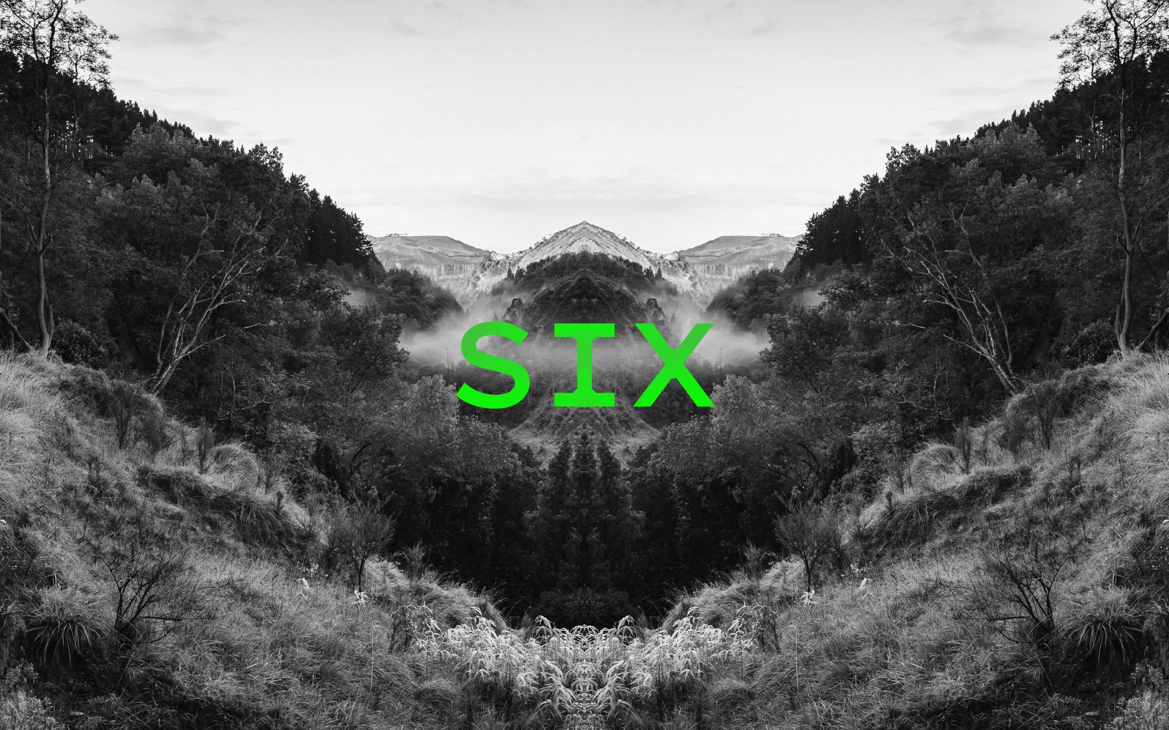 Podcast episode image for the 'Mr Lyttle Meets Mr Big' podcast. A moody black and white photograph of a misty country valley is mirrored vertically creating a Rorschach like effect with the episode number 'SIX' overlaid in vibrant green.