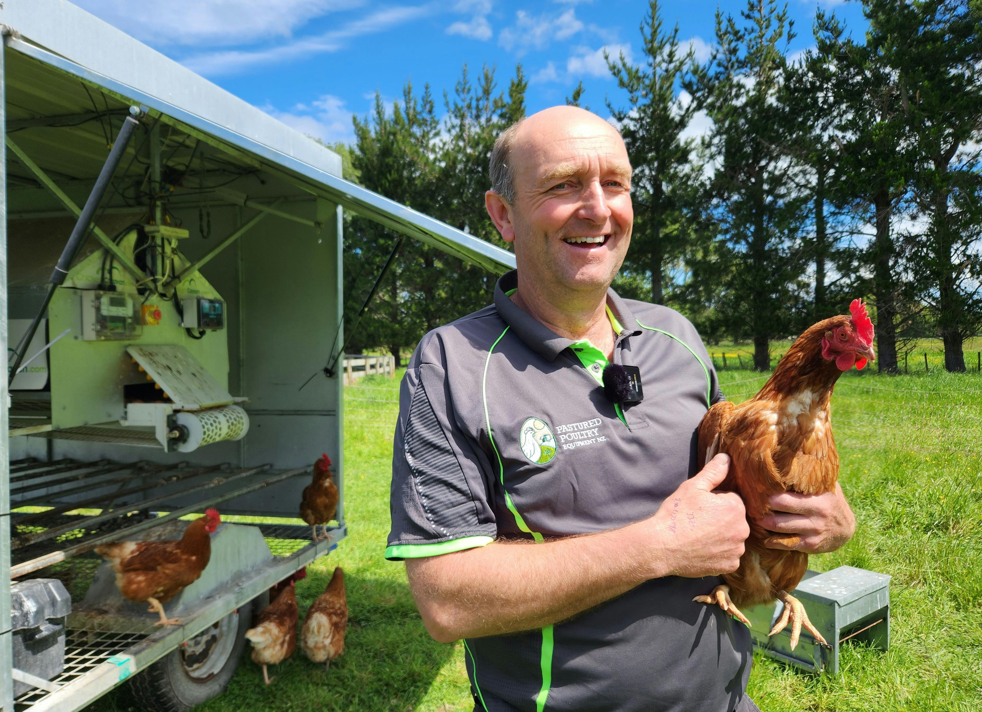 Lance Gillespie with chicken trailer and resident chook