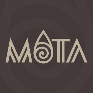 A large title displaying the word "Mata", where the letter "A" is represented in the shape of an abstract water drop. The background colour of the tile is dark brown.