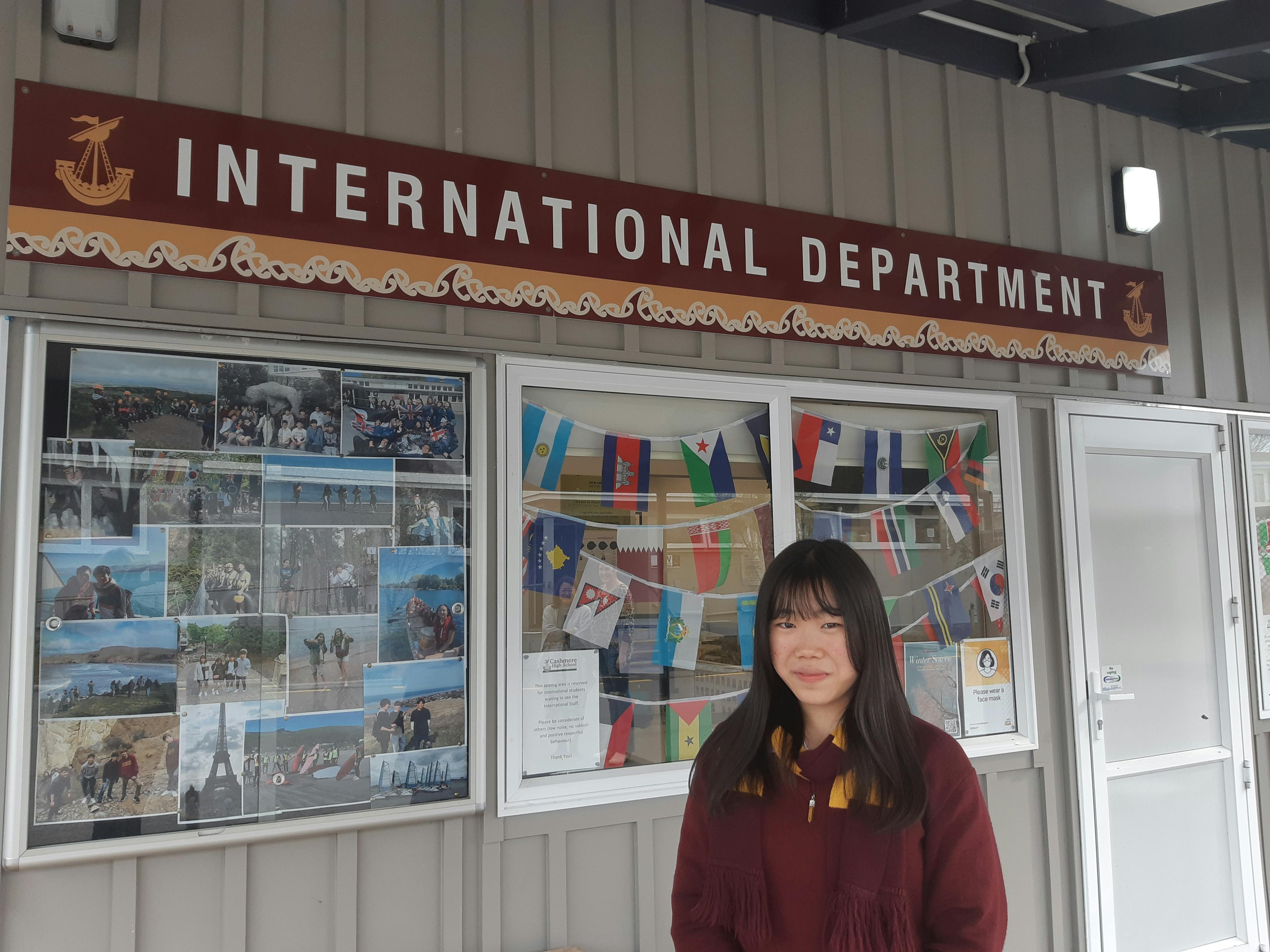 International student Akira Myojo, from Japan, in front of the International Department at Cashmere College