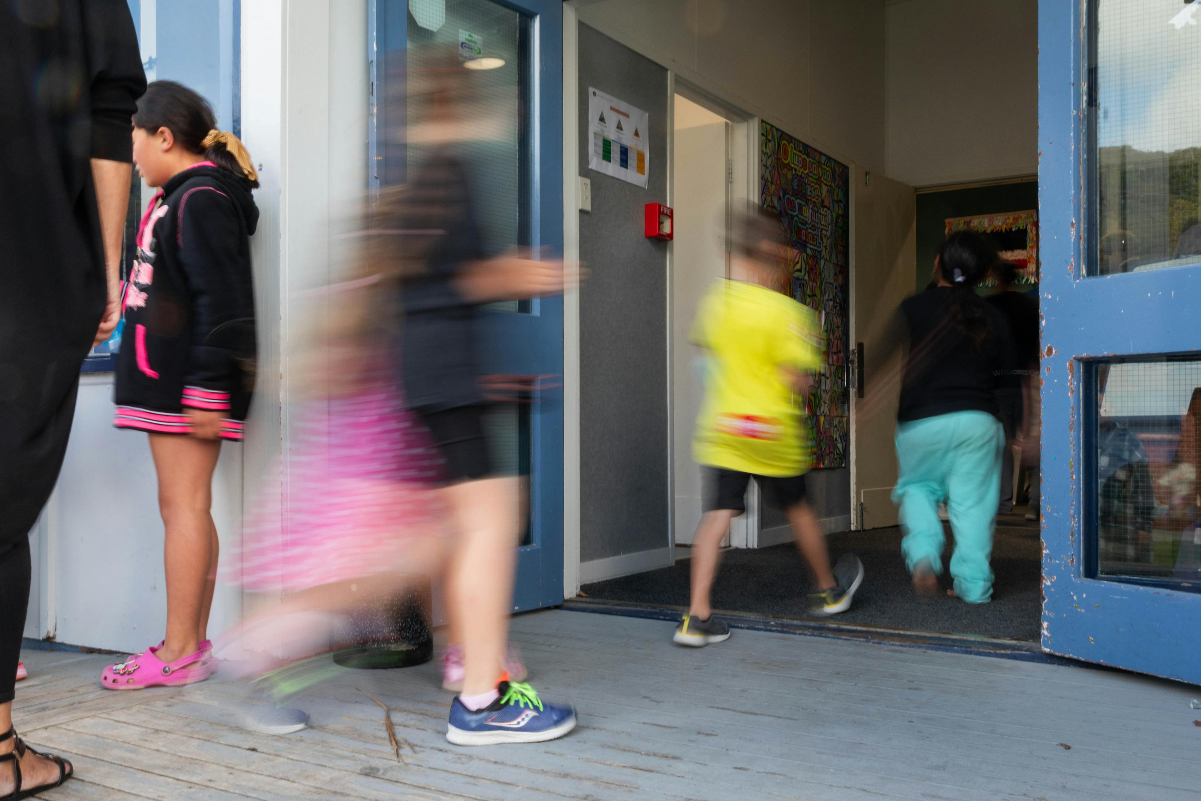 Children at Arakura School in Lower Hutt line up for free lunch, on 18 March, 2024.